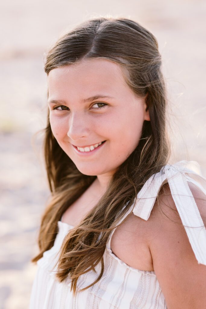 A portrait of a girl during family photos on Tybee.